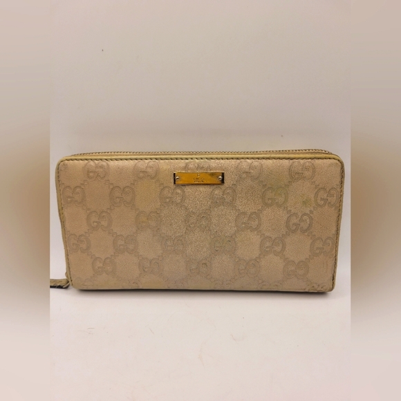 Gucci Handbags - Gucci Zip-Around Wallet in Guccissima Beige Leather